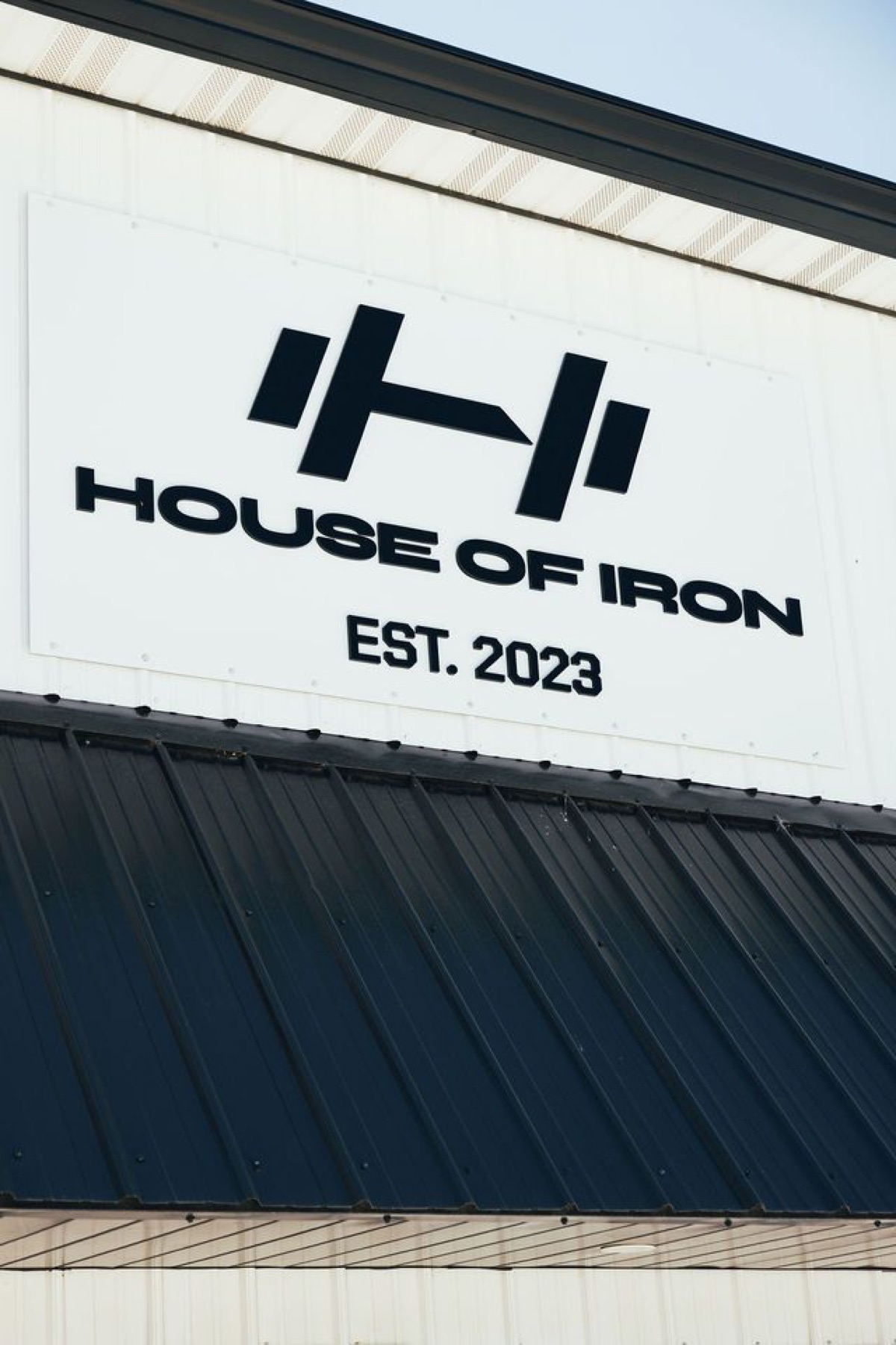 House of Iron sign mounted above the Westside entrance